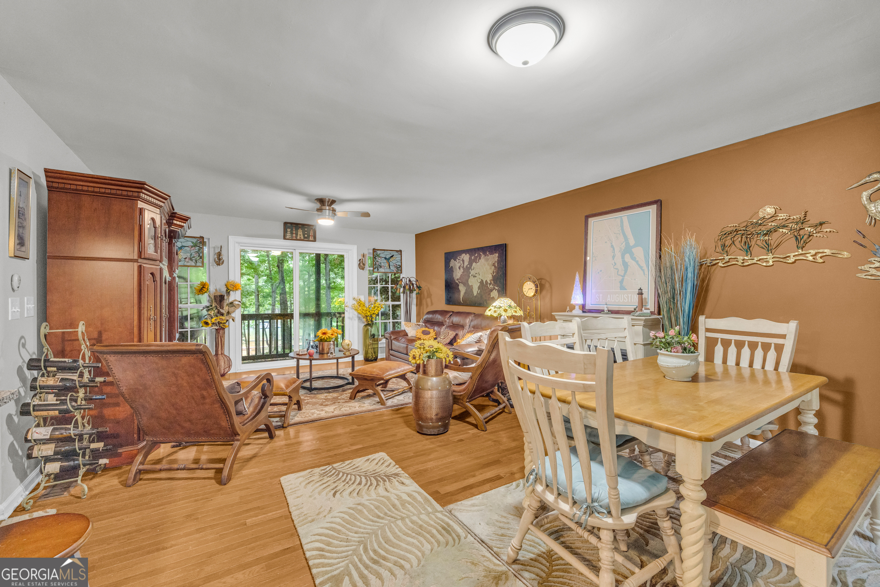 26 Chief Lane Hartwell, GA 30643 - Photo 14 of 65 a living room with furniture a large window and dining table
