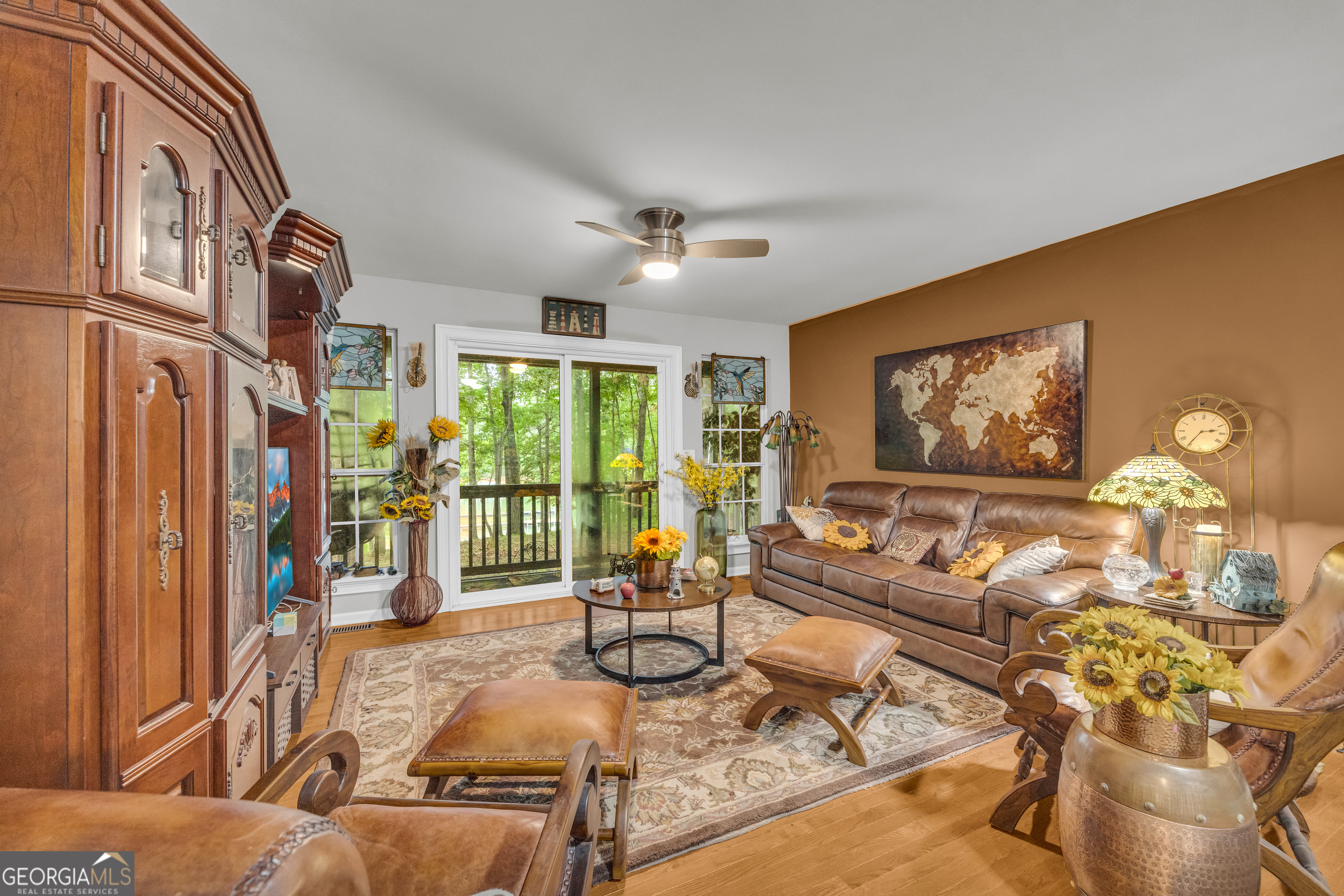 26 Chief Lane Hartwell, GA 30643 - Photo 17 of 65 a living room with furniture large window and flat screen tv