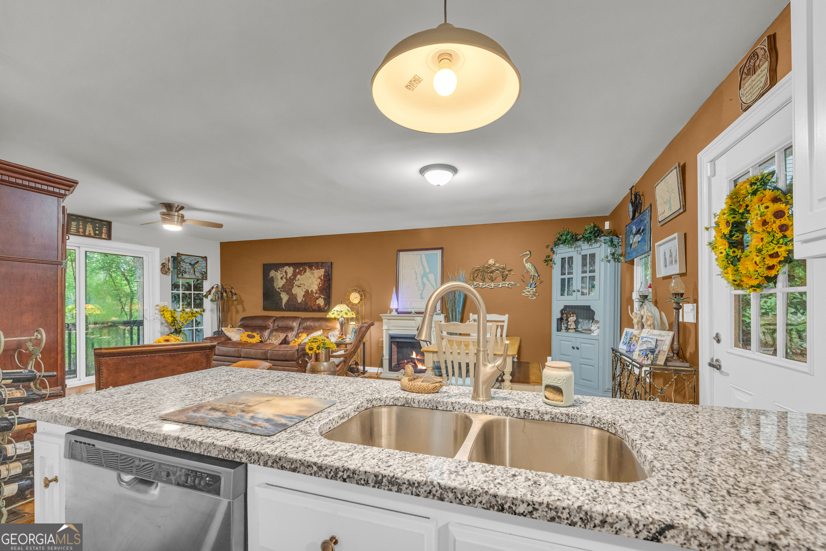 26 Chief Lane Hartwell, GA 30643 - Photo 23 of 65 a view of a kitchen counter a sink and dishwasher with wooden floor