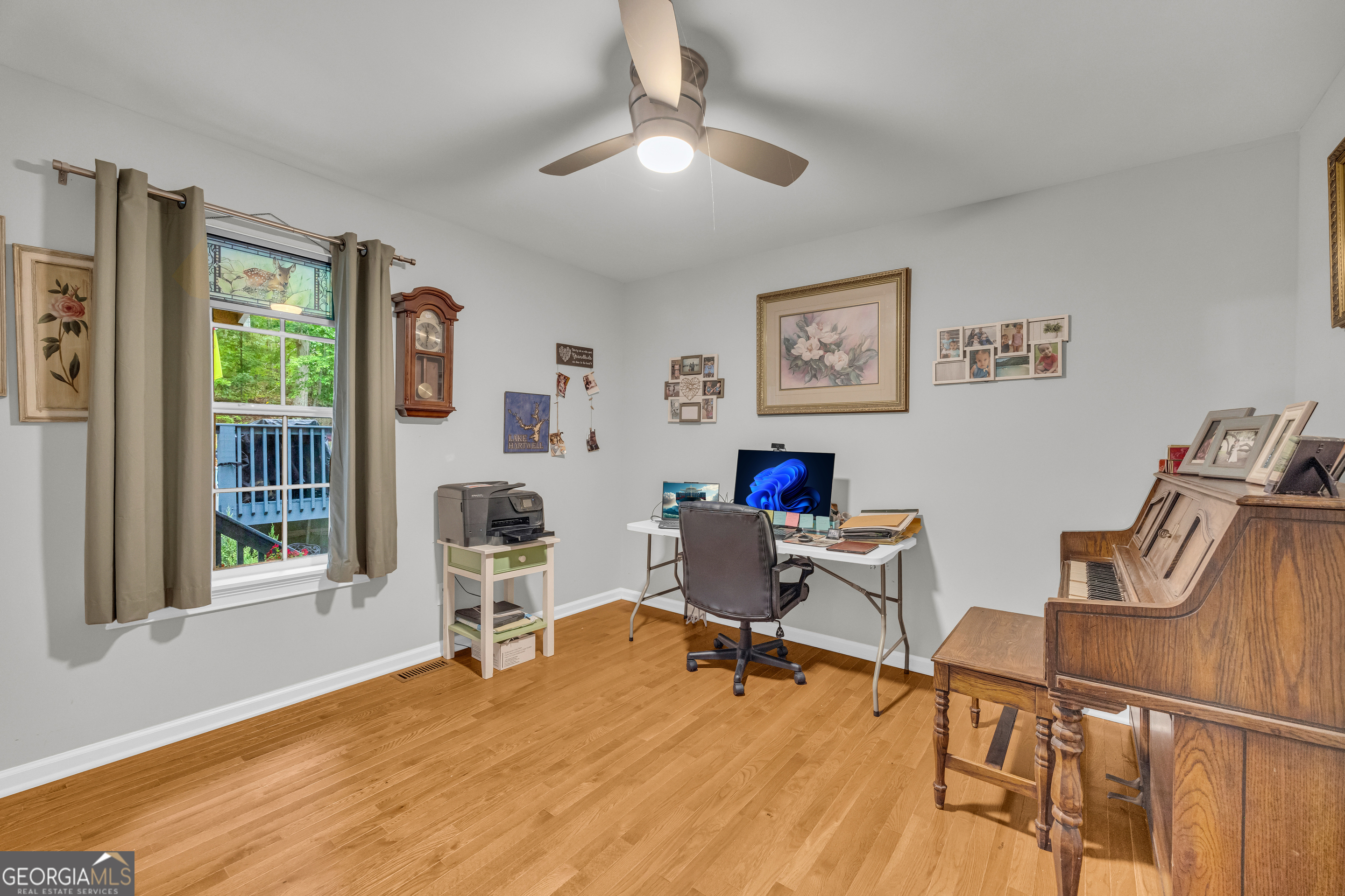 26 Chief Lane Hartwell, GA 30643 - Photo 28 of 65 a workspace with furniture hardwood and a window