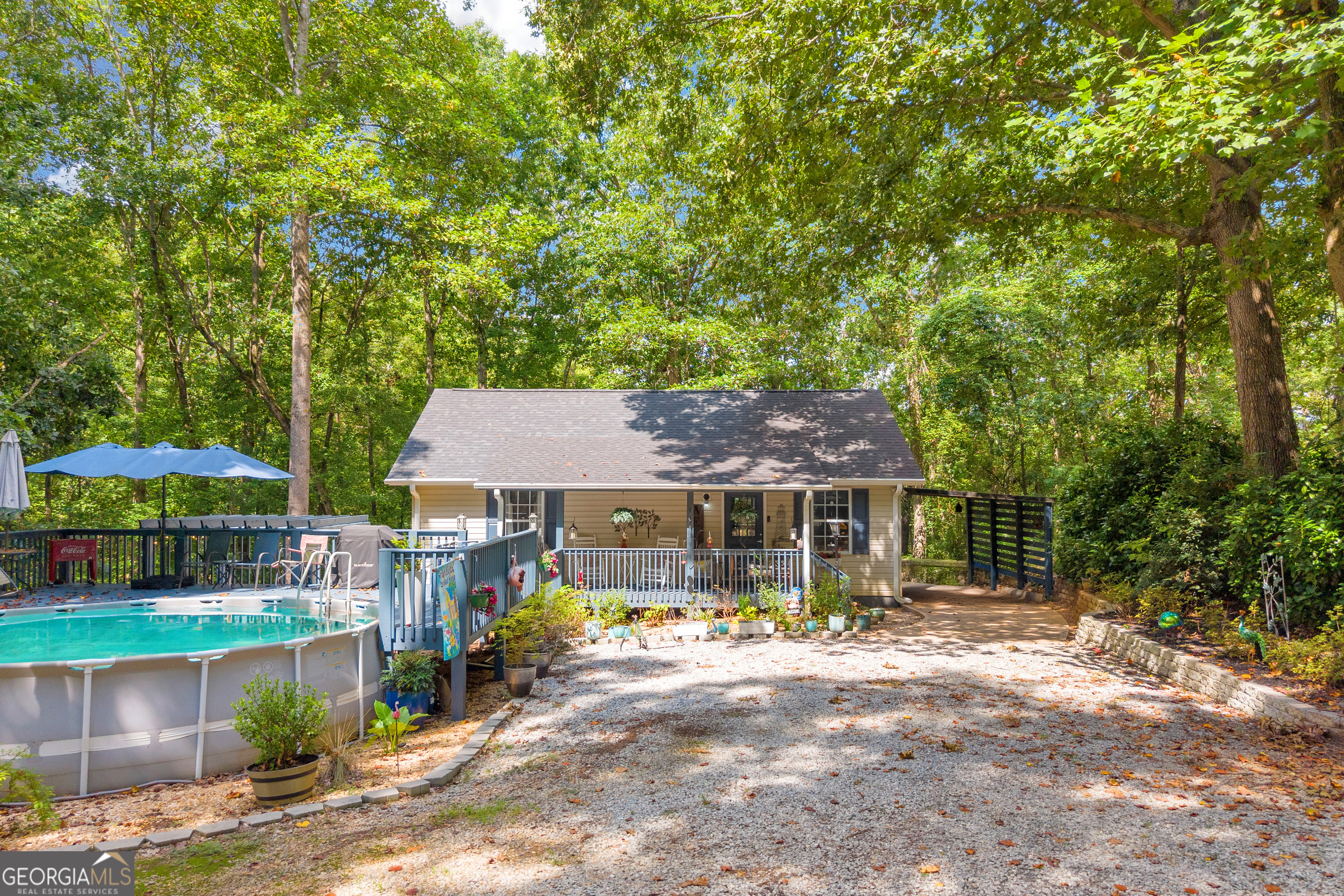 26 Chief Lane Hartwell, GA 30643 - Photo 55 of 65 a front view of a house with garden
