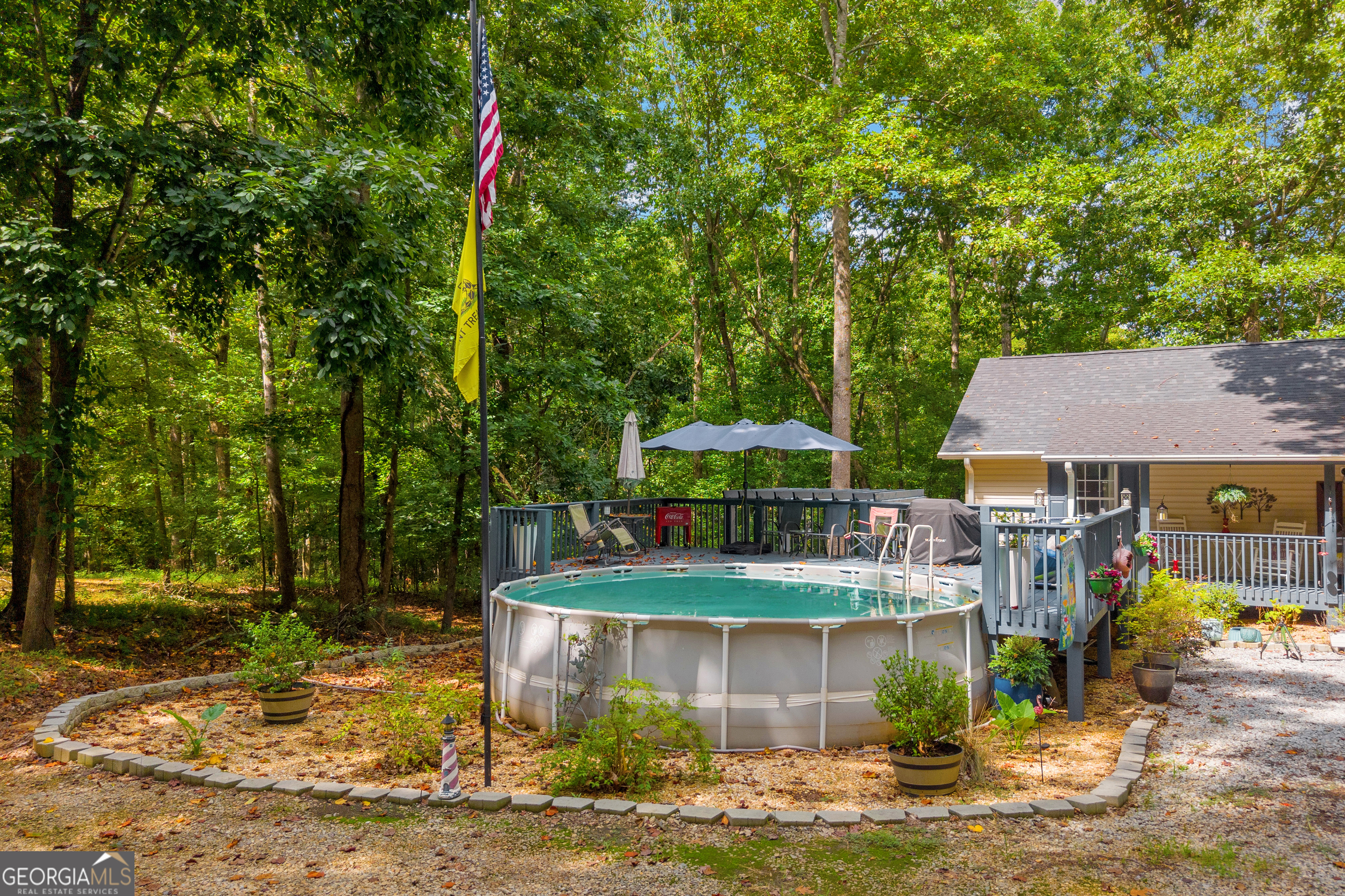 26 Chief Lane Hartwell, GA 30643 - Photo 57 of 65 a front view of a house with garden