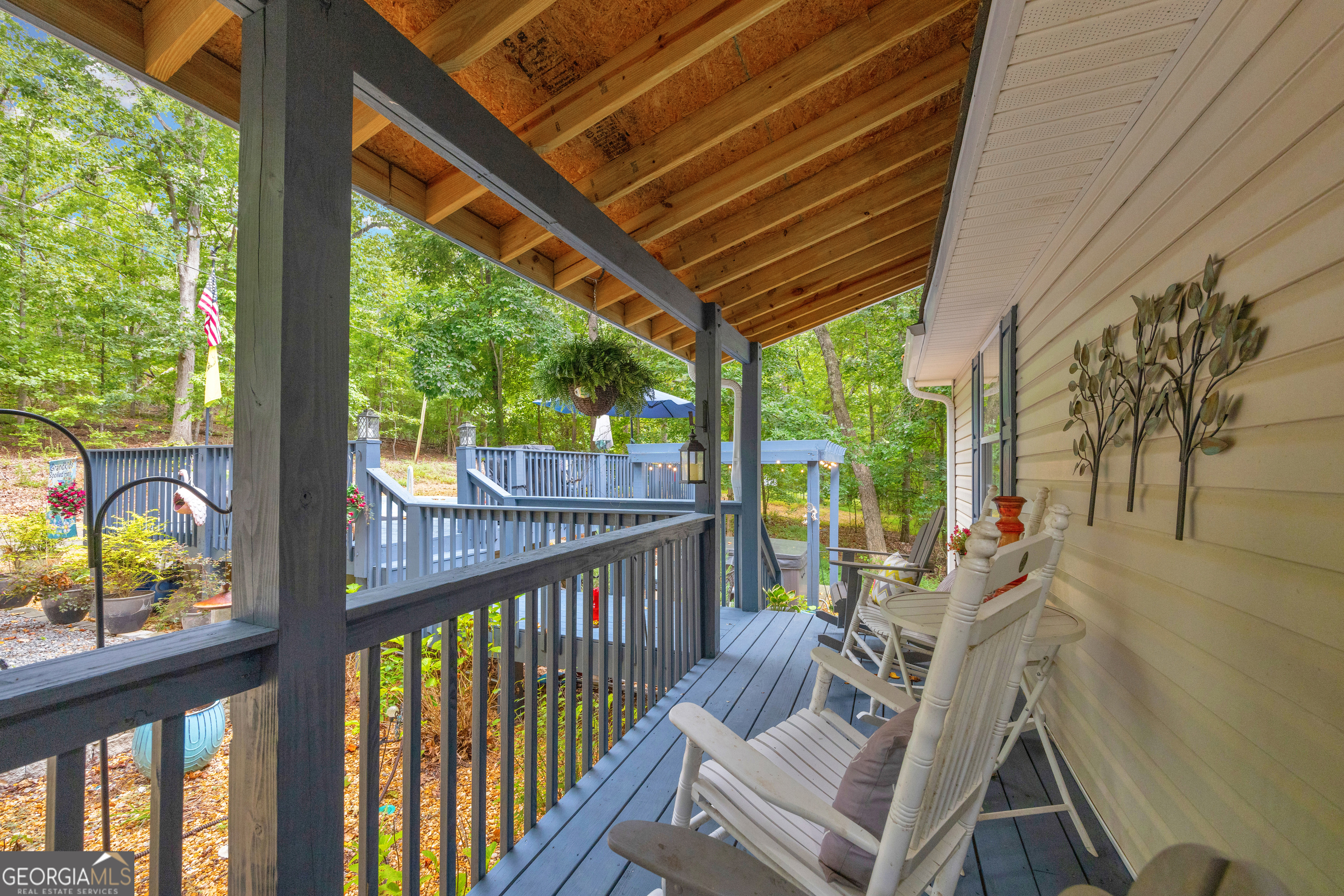 26 Chief Lane Hartwell, GA 30643 - Photo 9 of 65 a view of a chair and tables in the balcony