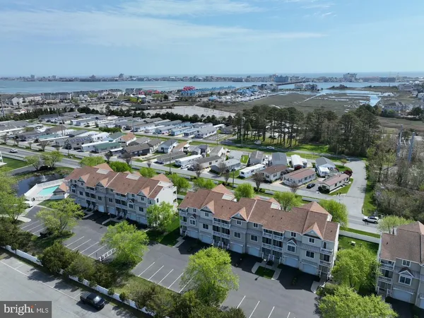 an aerial view of a house with a garden