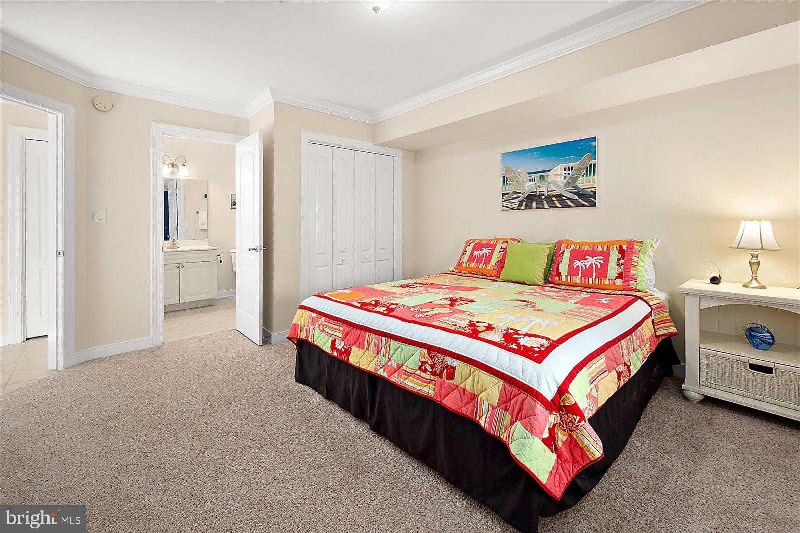 9823 Golf Course Road, Unit 7 Ocean City, MD 21842 - Photo 39 of 76 a bedroom with a bed and a area