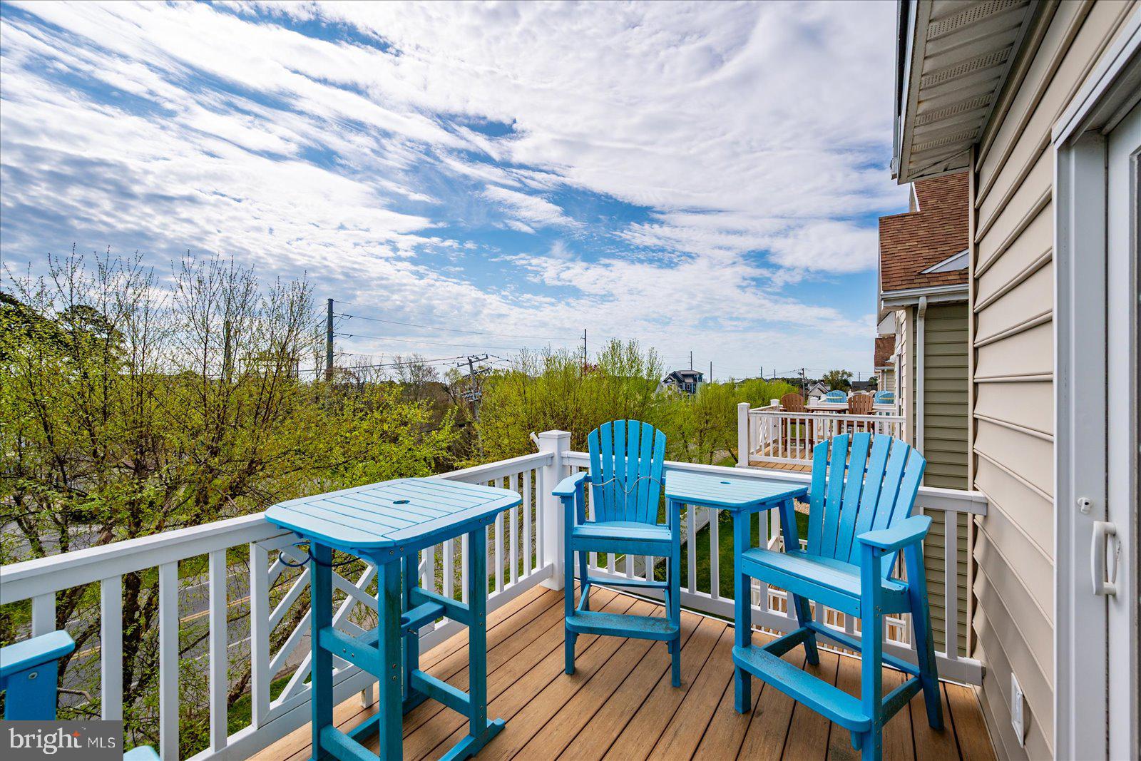 9823 Golf Course Road, Unit 7 Ocean City, MD 21842 - Photo 51 of 76 a view of a chairs on the roof deck