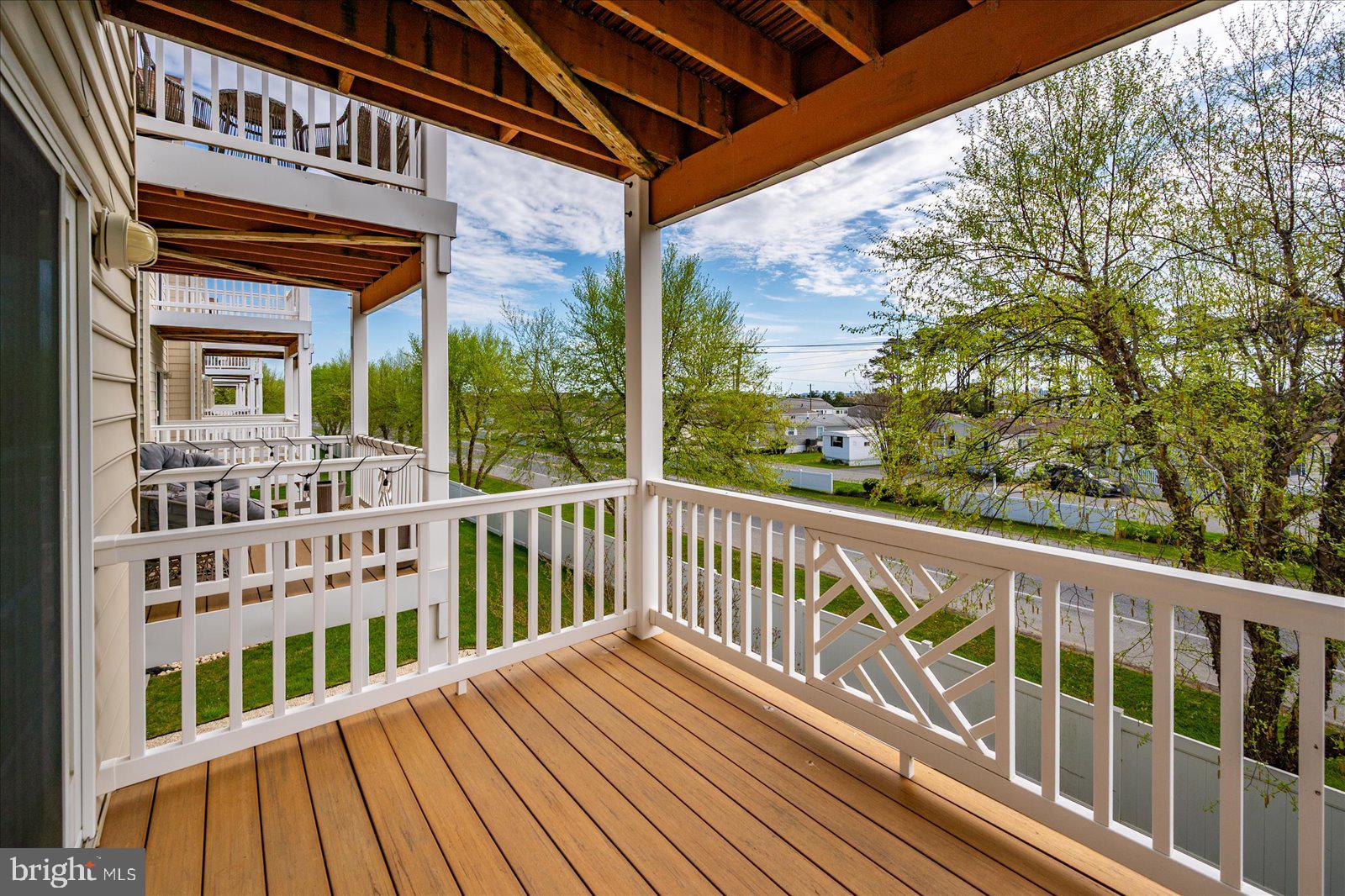 9823 Golf Course Road, Unit 7 Ocean City, MD 21842 - Photo 55 of 76 a view of a two chairs in the balcony