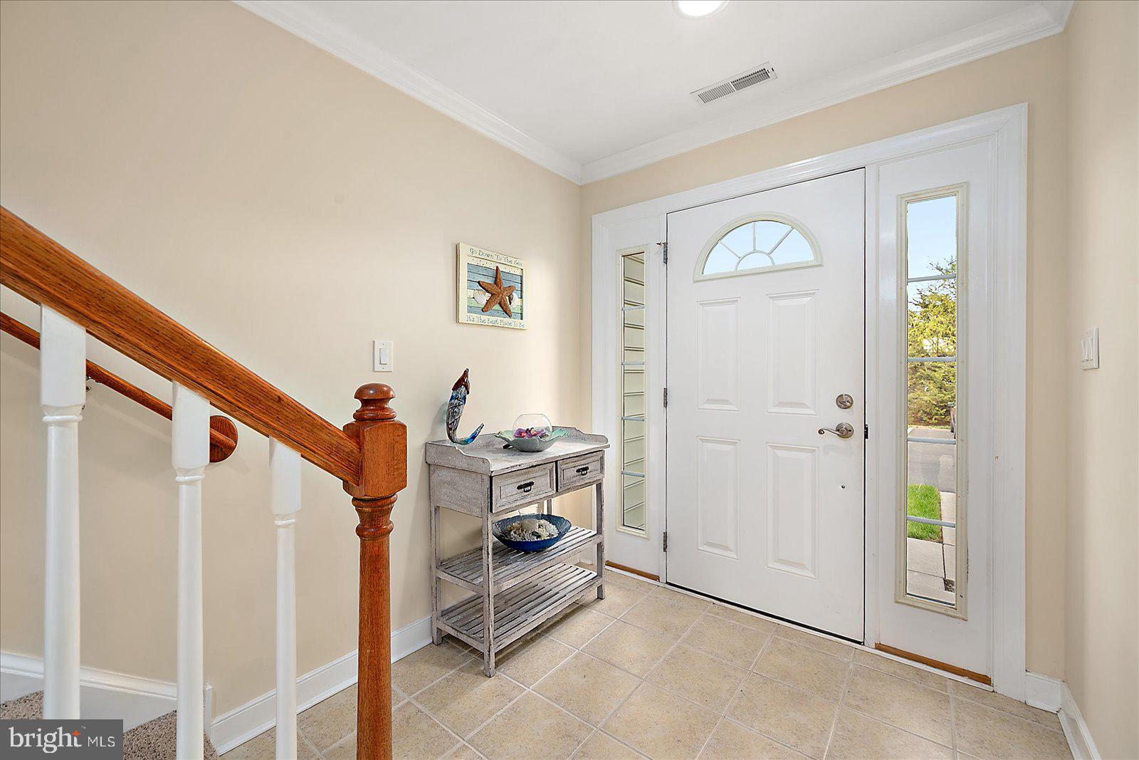 9823 Golf Course Road, Unit 7 Ocean City, MD 21842 - Photo 6 of 76 a view of a livingroom with wooden floor and a window