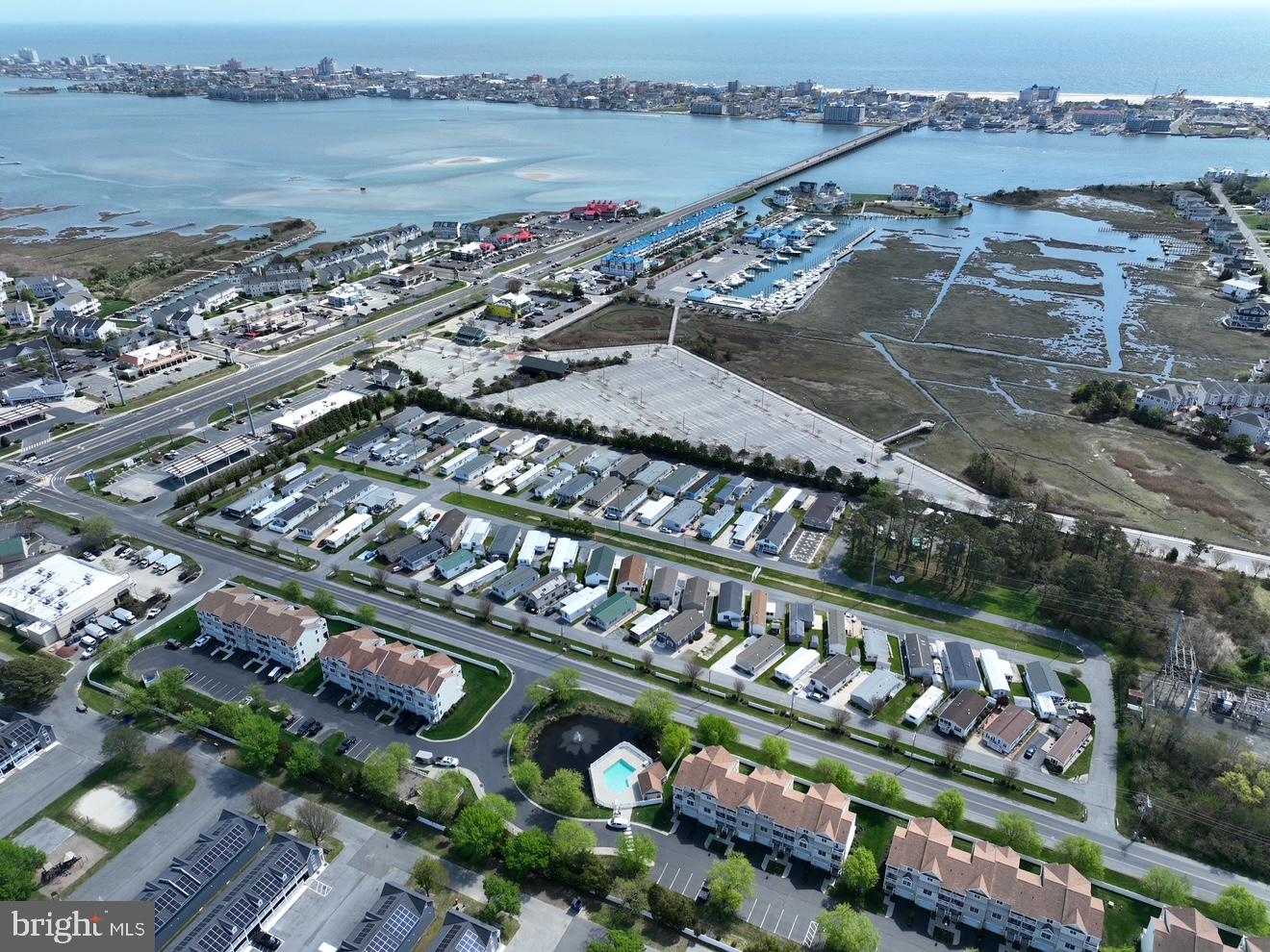 9823 Golf Course Road, Unit 7 Ocean City, MD 21842 - Photo 67 of 76 a city view from a lake