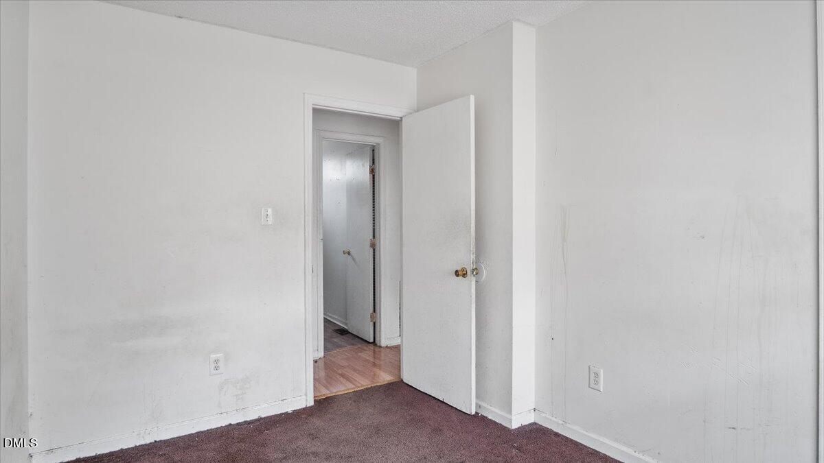 119 Fox Pond Road Henderson, NC 27537 - Photo 13 of 34 a view of a hallway with closet