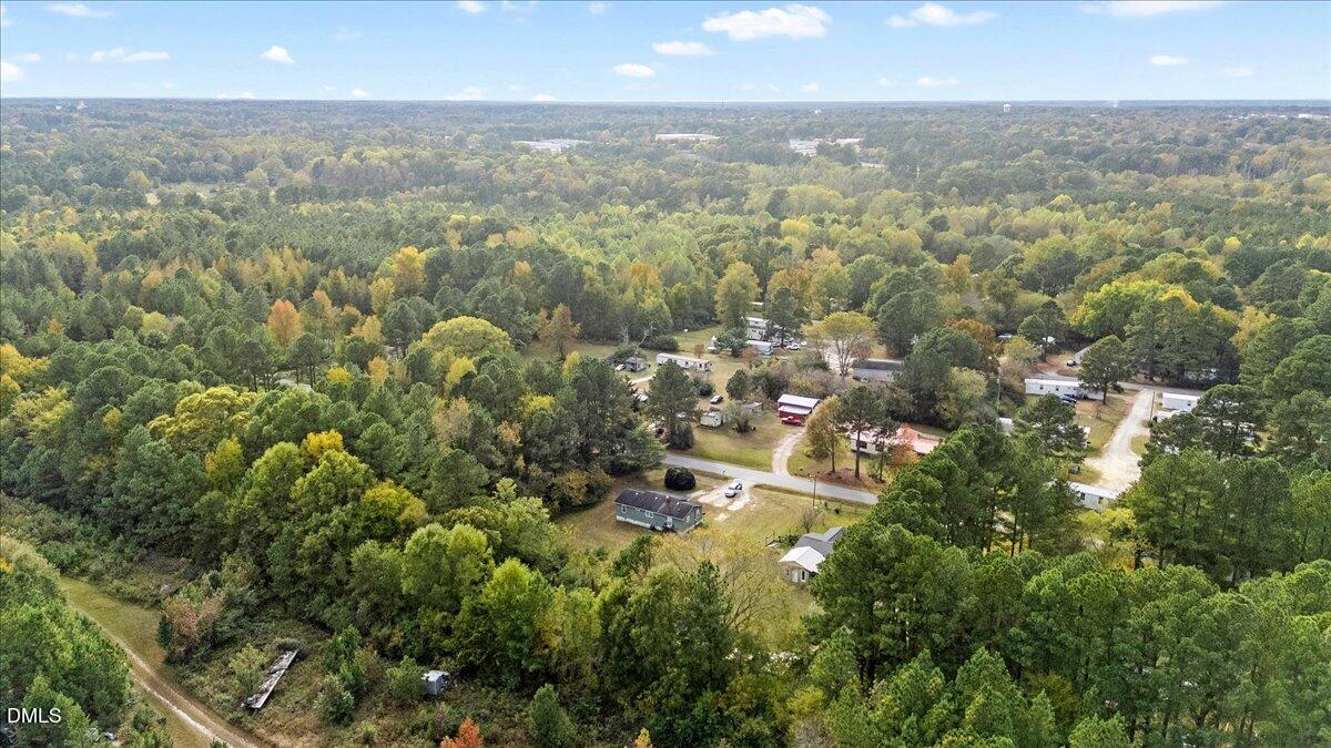 119 Fox Pond Road Henderson, NC 27537 - Photo 29 of 34 an aerial view of residential houses with city and outdoor space