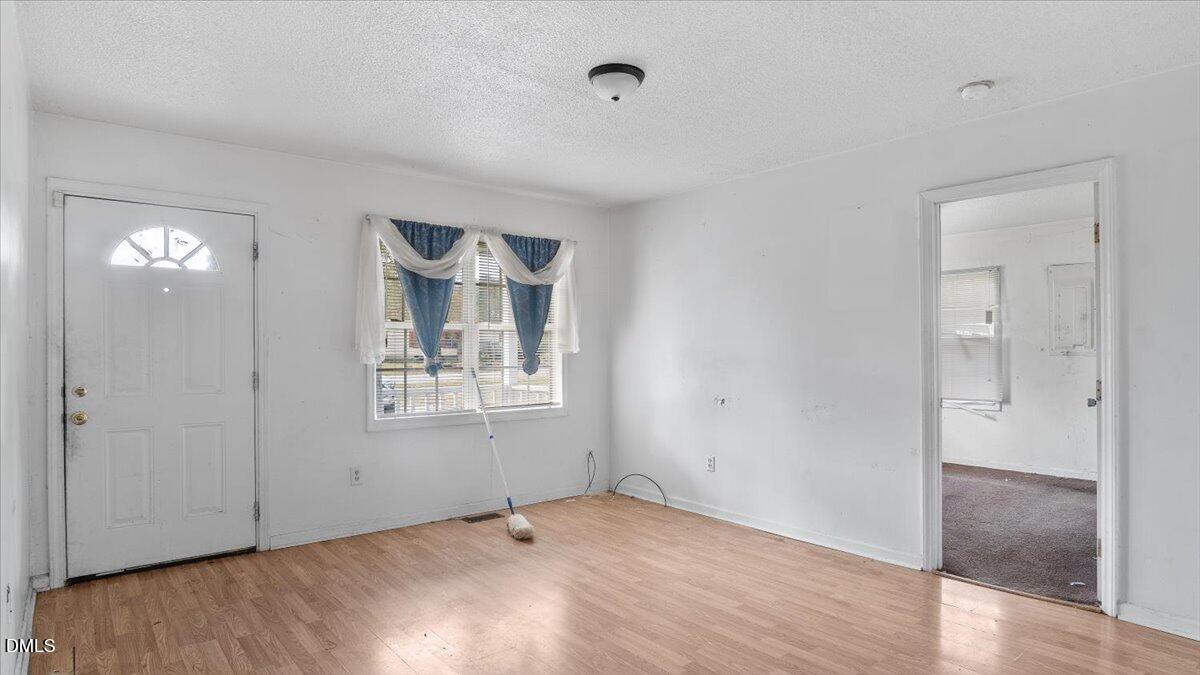 119 Fox Pond Road Henderson, NC 27537 - Photo 7 of 34 an empty room with windows and closet