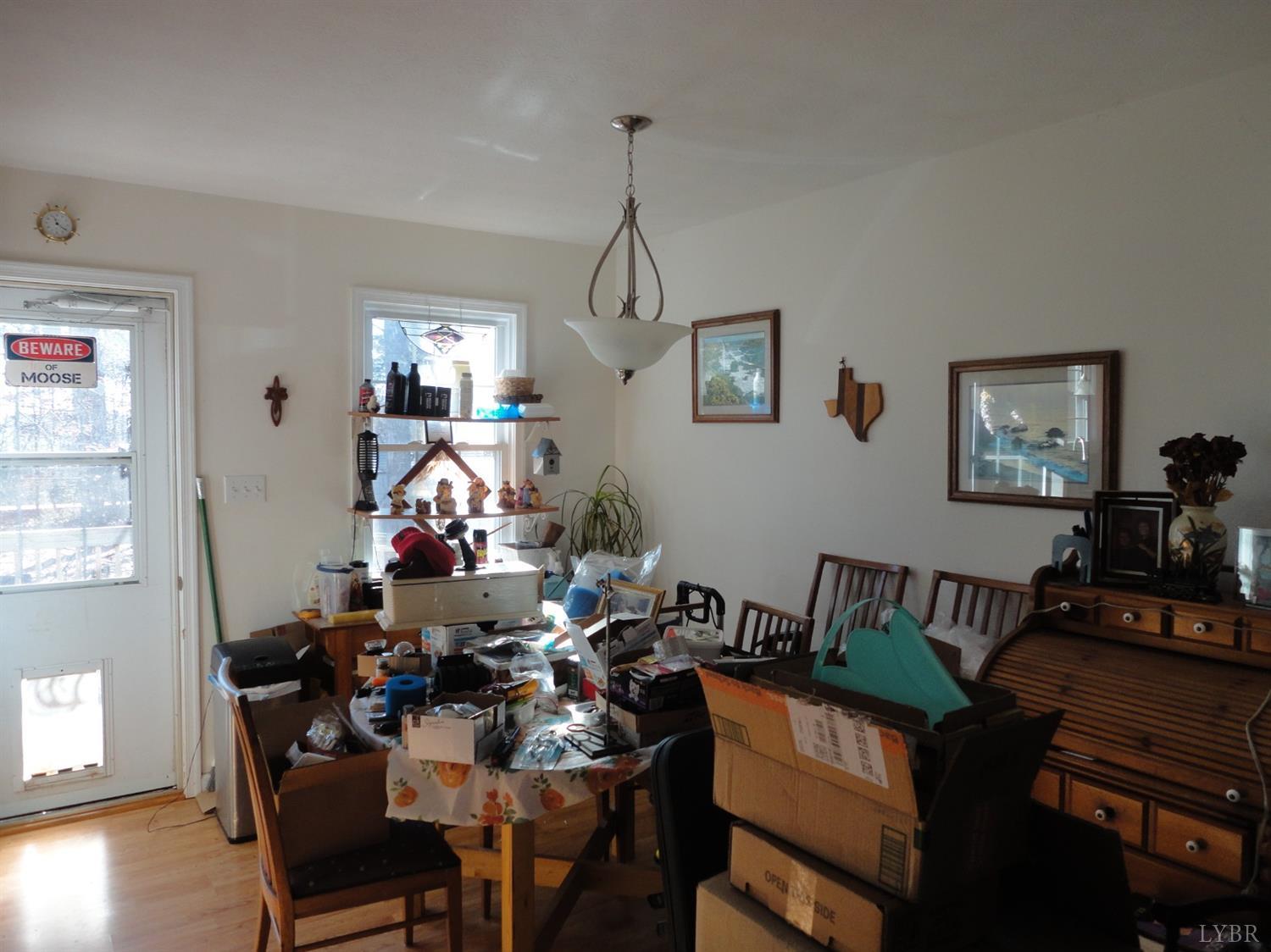 617 Phoebe Pond Road Concord, VA 24538 - Photo 5 of 11 a view of a dining room with furniture and wooden floor