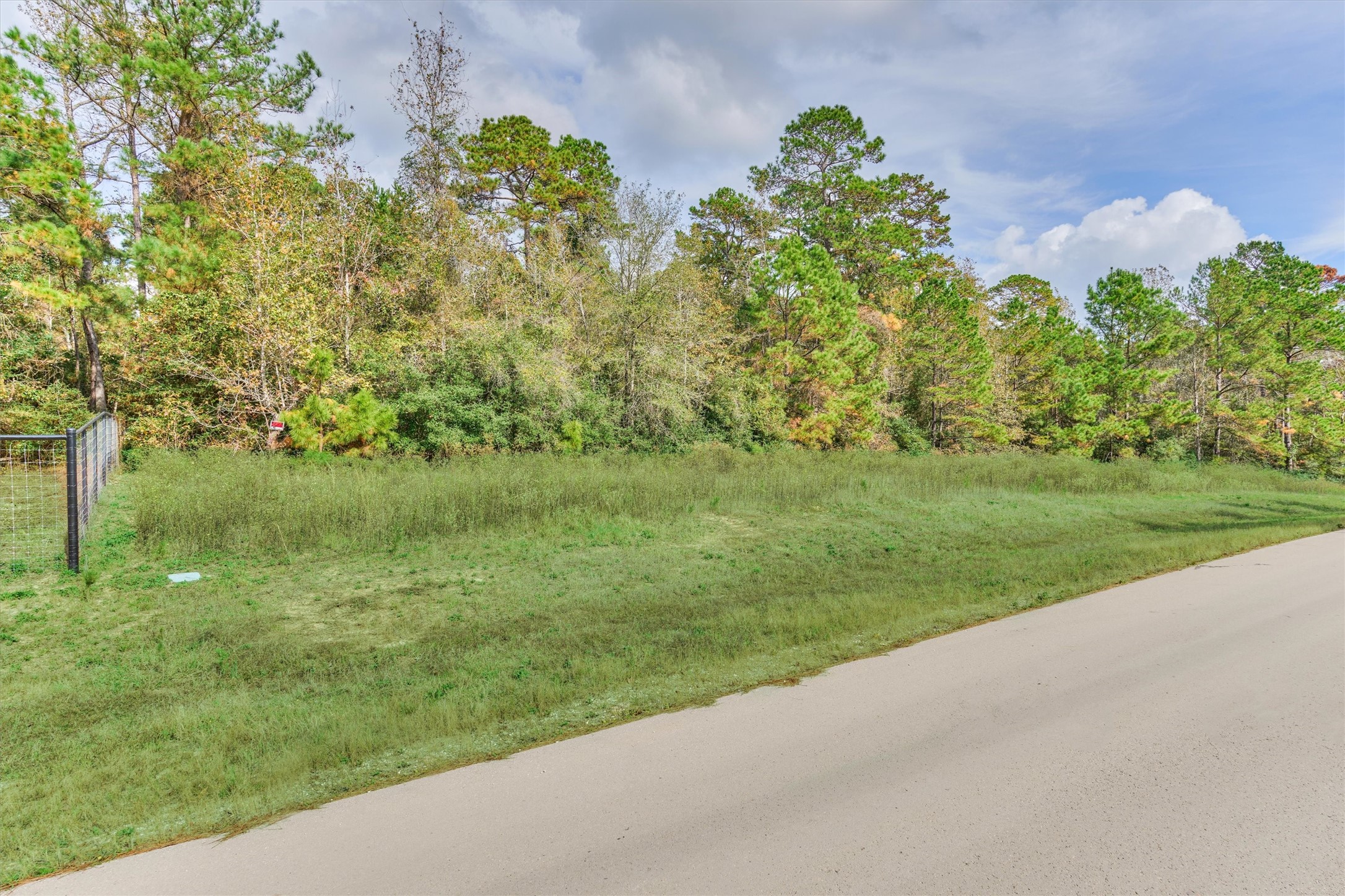 498 Lonestar Road Huntsville, TX 77340 - Photo 17 of 20 Fence denotes neighboring 6 acre property.