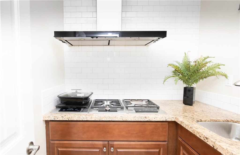 6162 Castleton Street Chino, CA 91710 - Photo 8 of 29 a close view of sink and tap