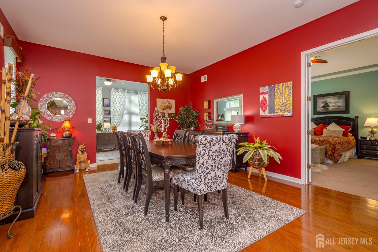 44 Kings Mill Road Monroe Township, NJ 08831 - Photo 16 of 38 a view of a dining room with furniture and chandelier