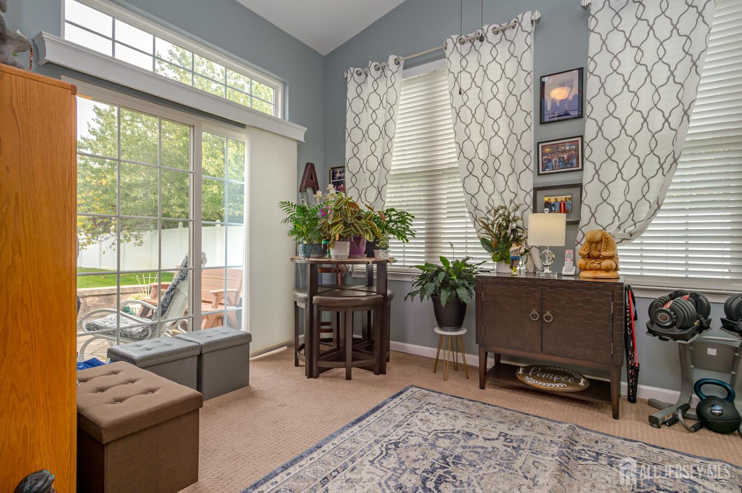 44 Kings Mill Road Monroe Township, NJ 08831 - Photo 18 of 38 a living room with furniture and a flat screen tv