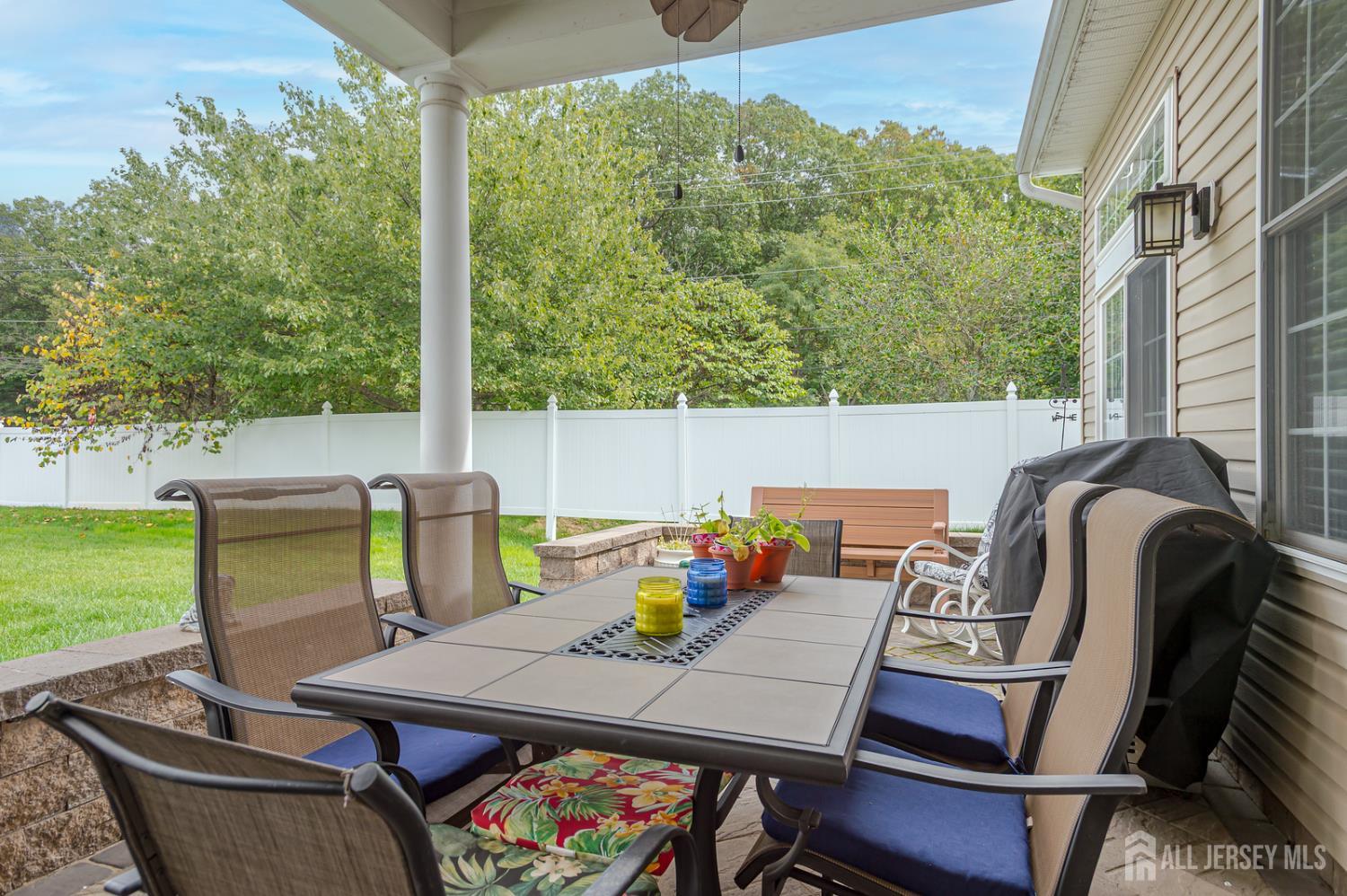 44 Kings Mill Road Monroe Township, NJ 08831 - Photo 2 of 38 a outdoor dining space with furniture and outdoor view