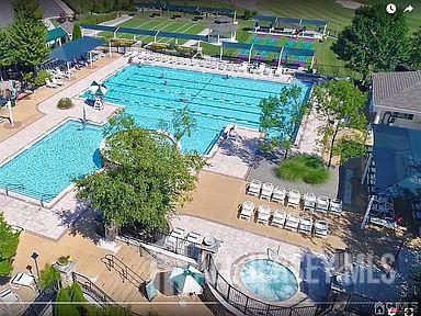 44 Kings Mill Road Monroe Township, NJ 08831 - Photo 31 of 38 a backyard of a house with outdoor seating