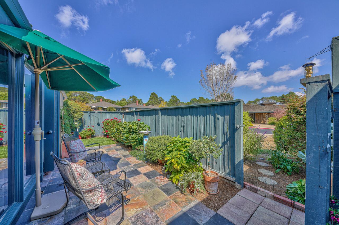105 Del Mesa Carmel Carmel, CA 93923 - Photo 17 of 35 a view of a backyard with plants and outdoor seating