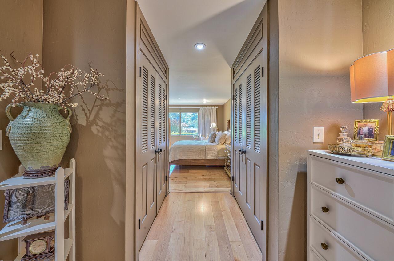 105 Del Mesa Carmel Carmel, CA 93923 - Photo 20 of 35 a view of a hallway to a livingroom and a couch
