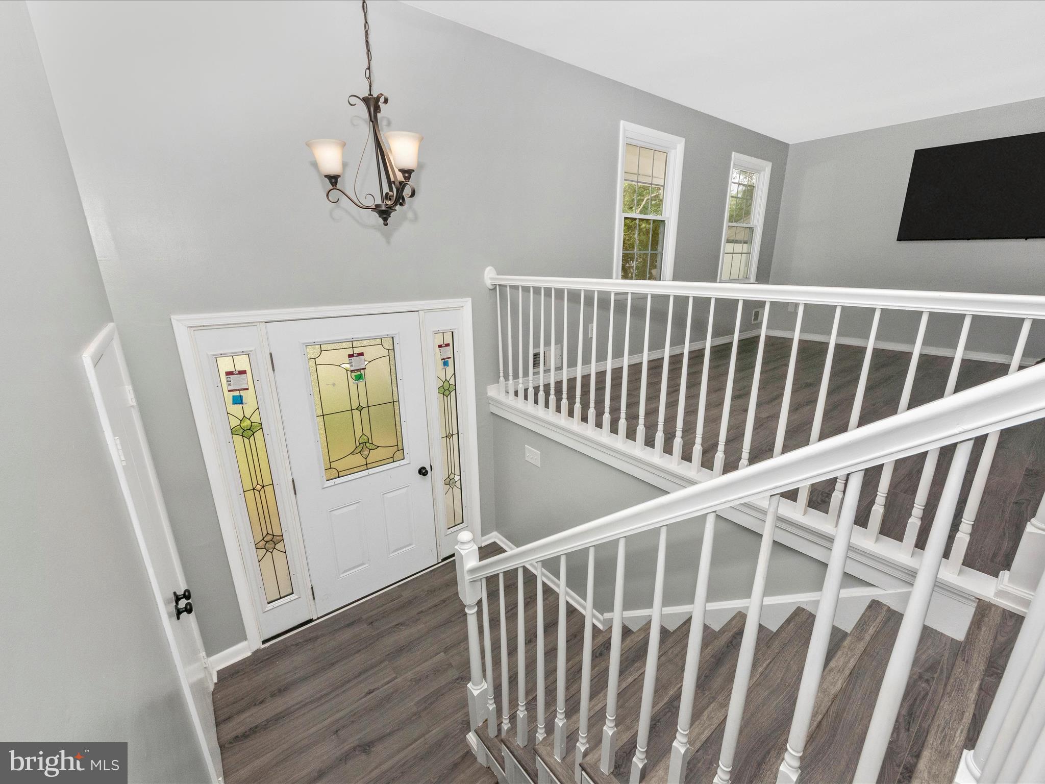 6503 Walker Branch Drive Laurel, MD 20707 - Photo 2 of 36 a view of entryway with wooden floor and windows