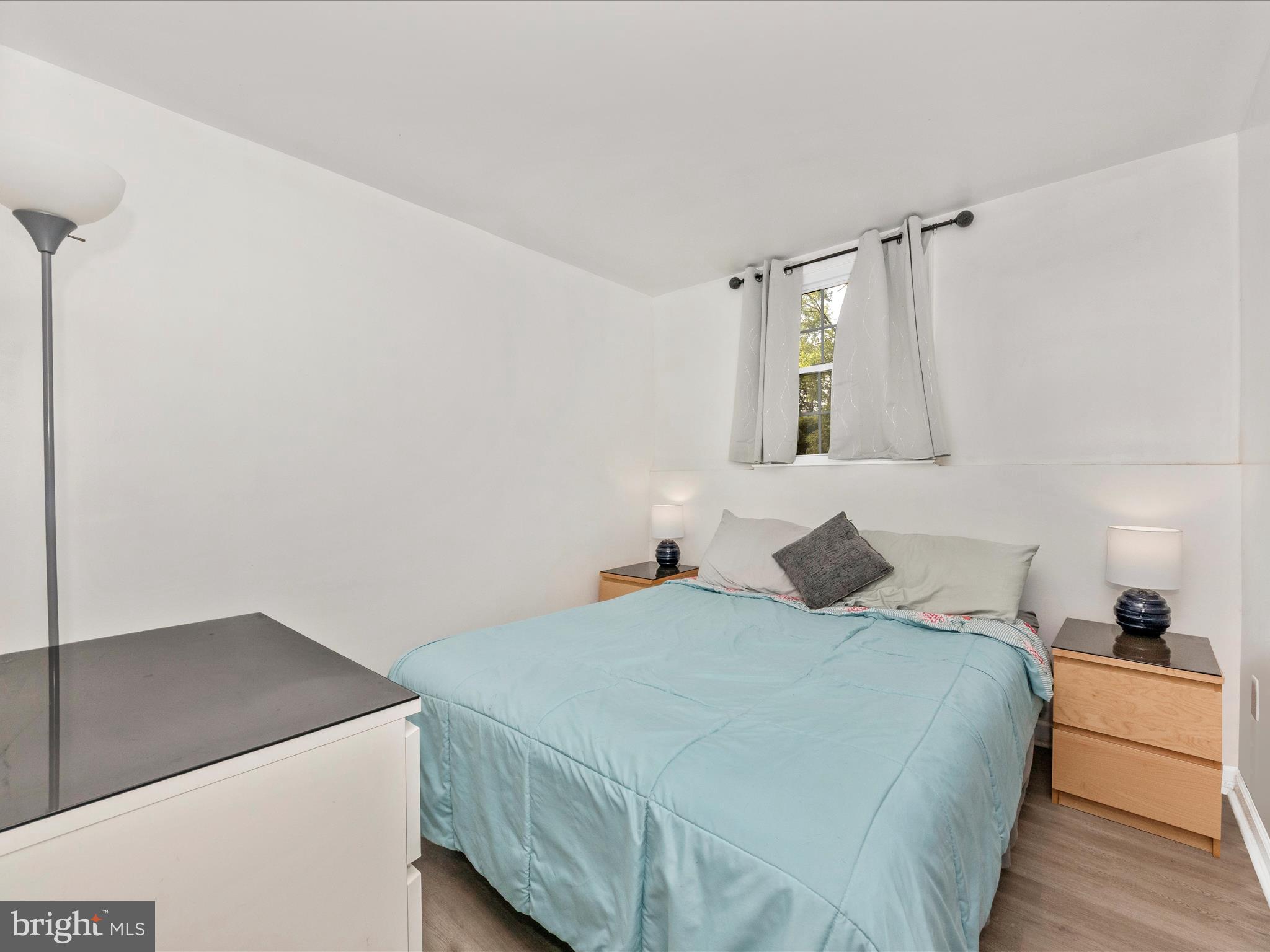 6503 Walker Branch Drive Laurel, MD 20707 - Photo 26 of 36 a bedroom with a bed and a cabinets