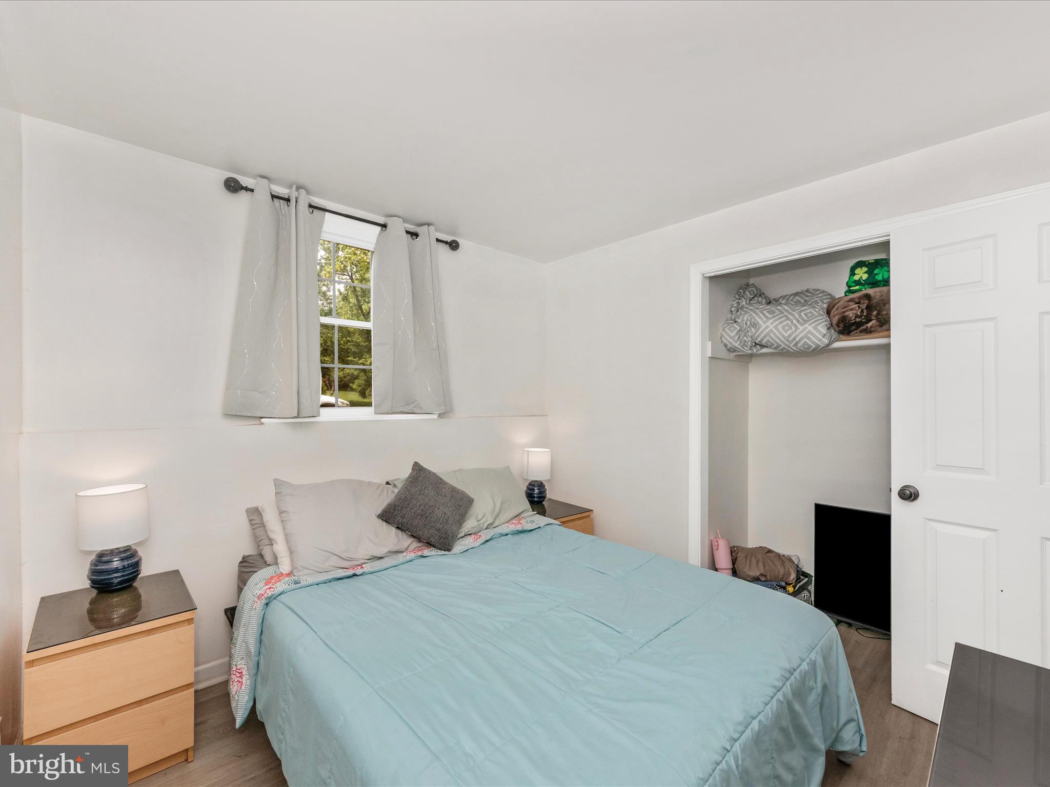 6503 Walker Branch Drive Laurel, MD 20707 - Photo 27 of 36 a bedroom with a bed and a window