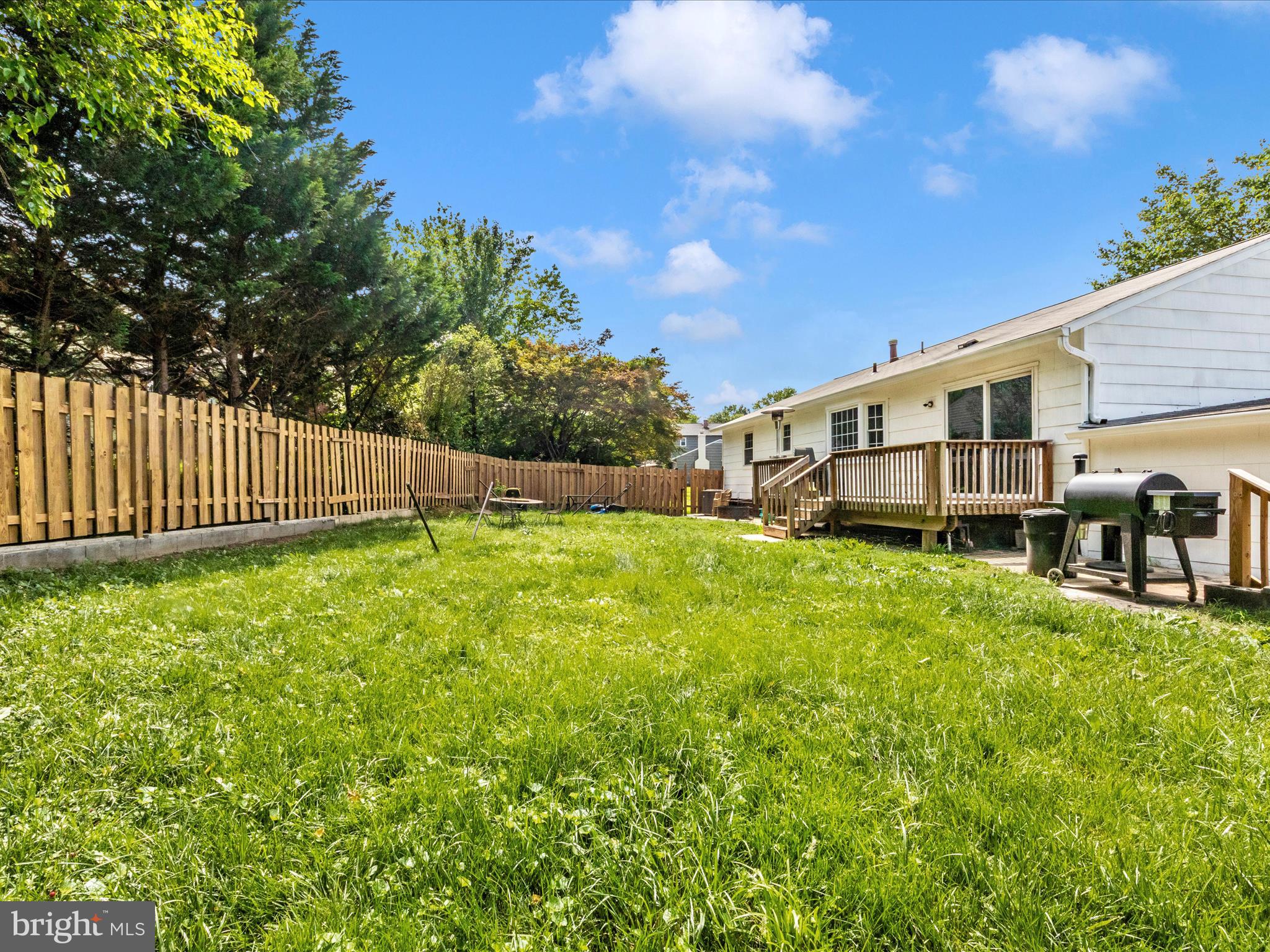 6503 Walker Branch Drive Laurel, MD 20707 - Photo 33 of 36 a view of a house with backyard and sitting area