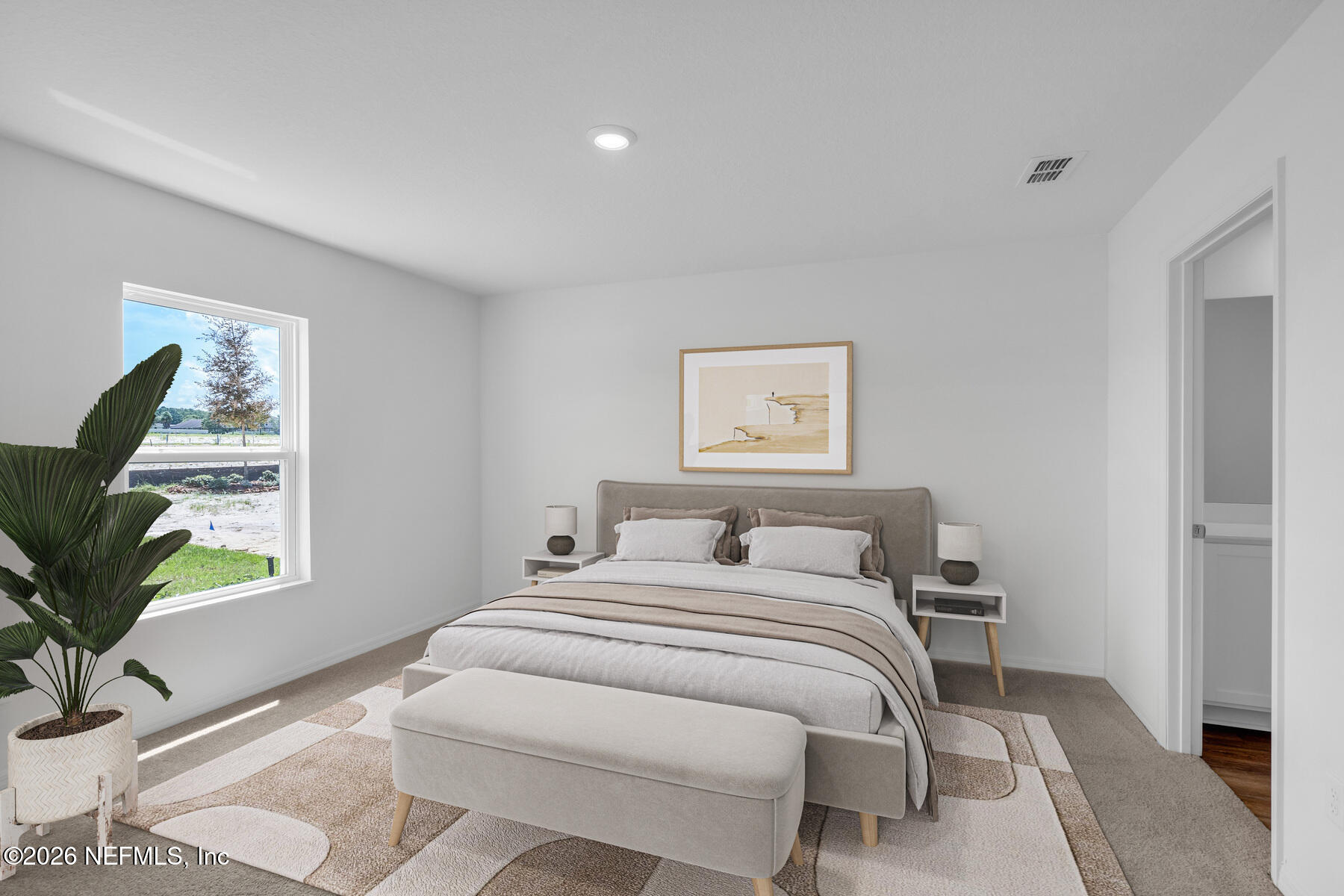 37397 Whisper Way Hilliard, FL 32046 - Photo 5 of 14 a bedroom with a large bed and a window