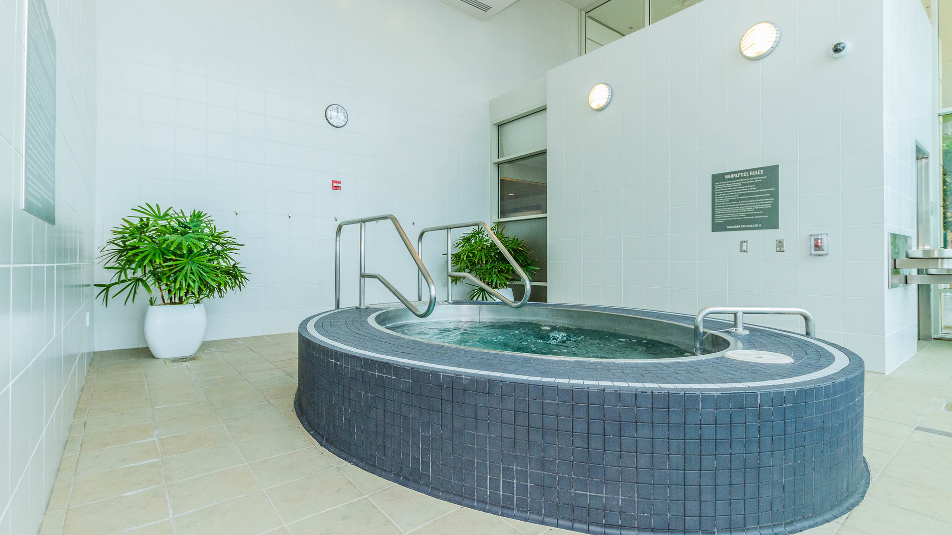 340 East Randolph Street, Unit 1106 Chicago, IL 60601 - Photo 19 of 19 a white bath tub sitting in a bathroom