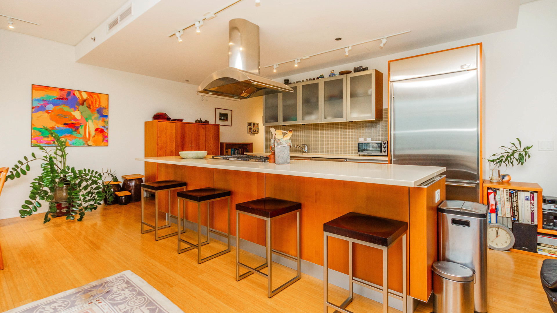 340 East Randolph Street, Unit 1106 Chicago, IL 60601 - Photo 8 of 19 a dining hall with stainless steel appliances kitchen island granite countertop a sink and cabinets
