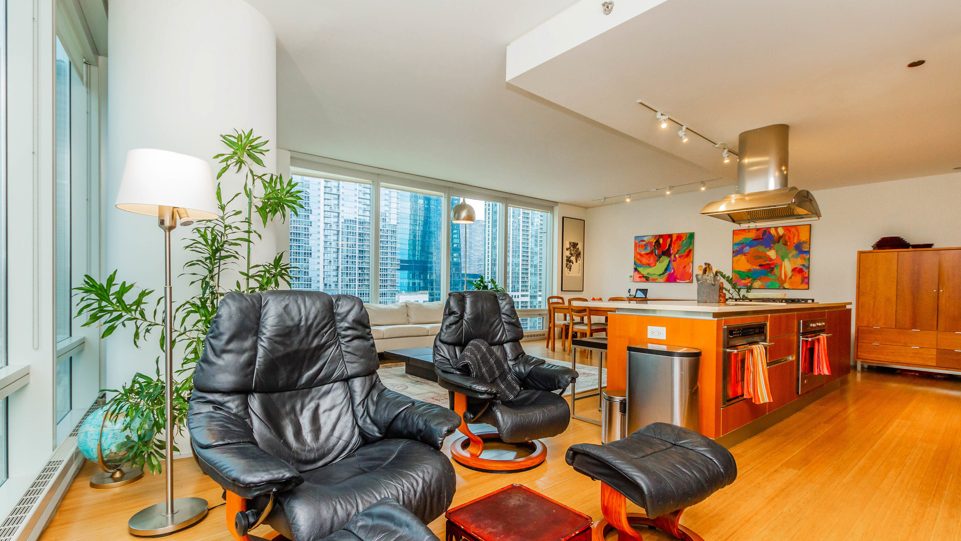 340 East Randolph Street, Unit 1106 Chicago, IL 60601 - Photo 10 of 19 a living room with furniture and a large window