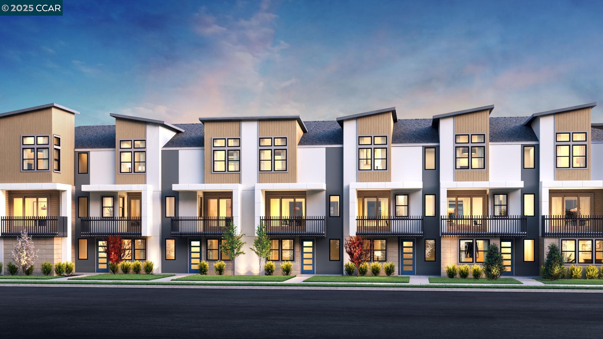 1968 Journey Street Milpitas, CA 95035 - Photo 11 of 12 a front view of residential apartment building with a yard