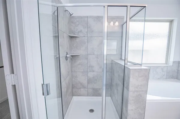 a bathroom with a granite countertop sink mirror and