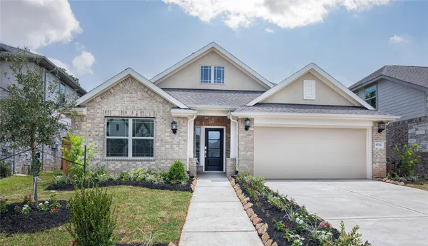 a front view of a house with a shower