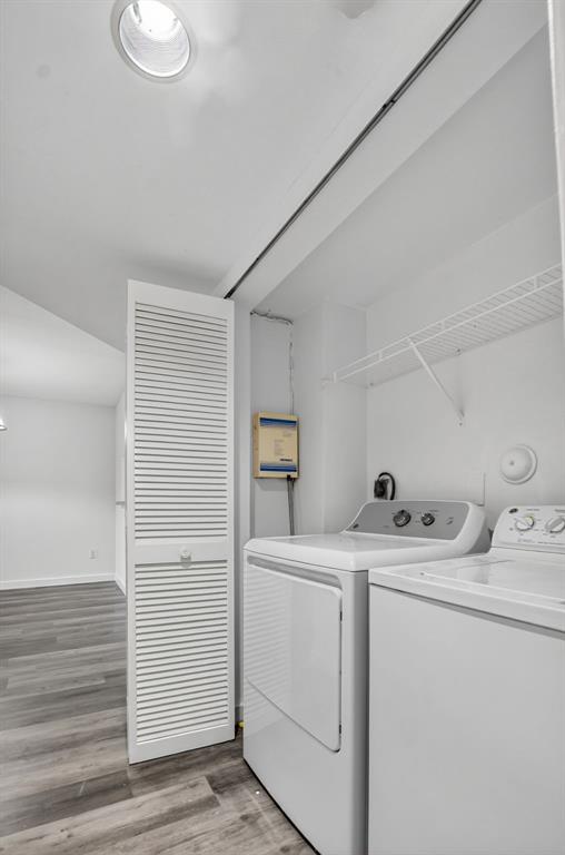 260 Northwest 67th Street, Unit A104 Boca Raton, FL 33487 - Photo 26 of 43 a utility room with dryer and washer