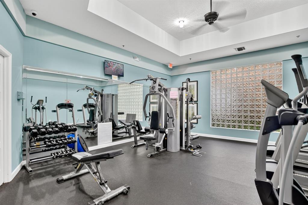 260 Northwest 67th Street, Unit A104 Boca Raton, FL 33487 - Photo 32 of 43 a view of a room with gym equipment