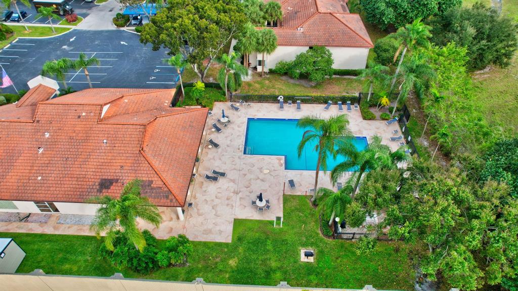 260 Northwest 67th Street, Unit A104 Boca Raton, FL 33487 - Photo 42 of 43 an aerial view of a house with garden space and street view