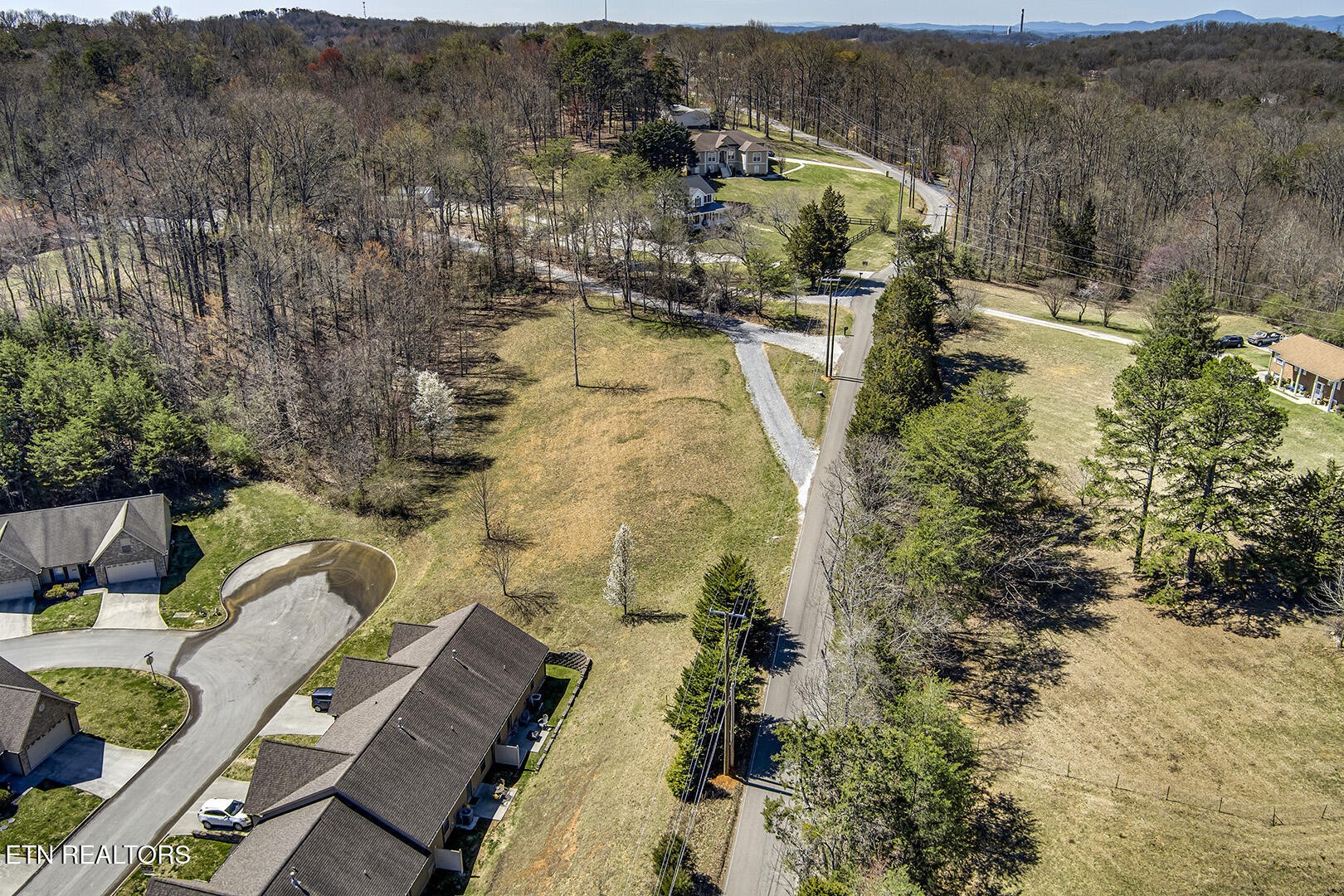 0 Cate Road Powell, TN 37849 - Photo 4 of 17 a view of a lake with a mountain