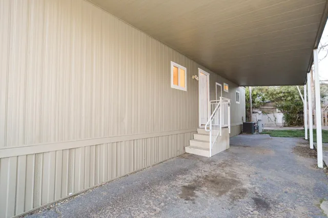 a view of a porch with furniture
