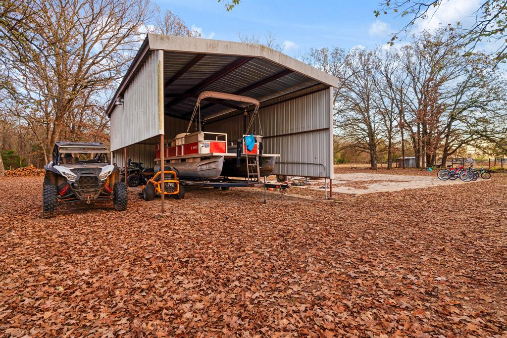 333 County Road Powderly, TX 75473 - Photo 3 of 15 a view of car parked in front of house