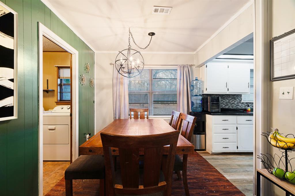 333 County Road Powderly, TX 75473 - Photo 6 of 15 a view of a dining room with furniture and chandelier