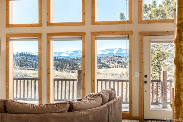 a view of a porch with a furniture