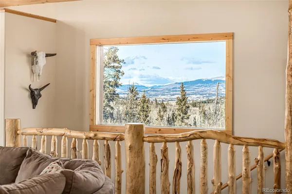 a view of a glass door and a window