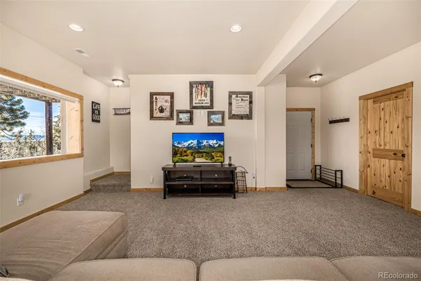 a bed room with a bed and a couch