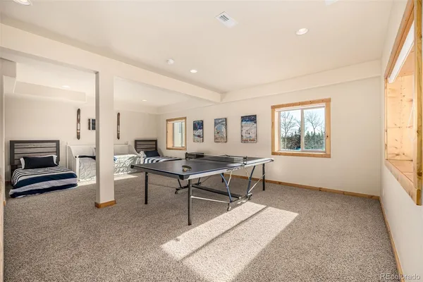a living room with furniture and a table