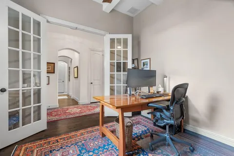 a workspace with furniture and a window