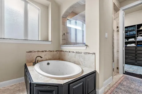 a bathroom with a sink and a bathtub