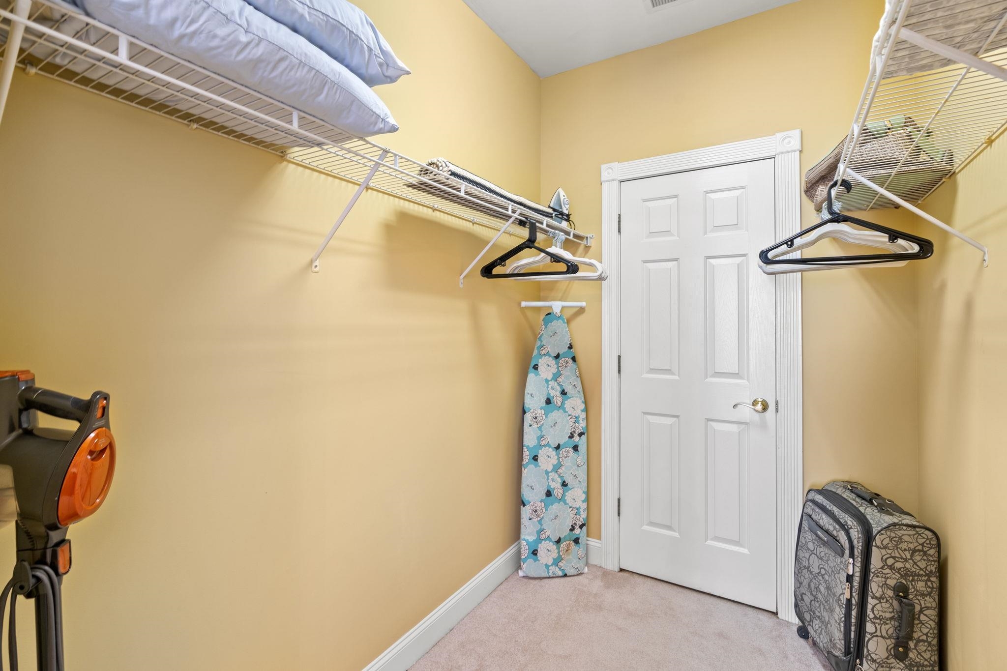 4895 Luster Leaf Circle, Unit 104 Myrtle Beach, SC 29577 - Photo 15 of 40 The door in this closet houses the HVAC and Water Heater. Both have been replaced.